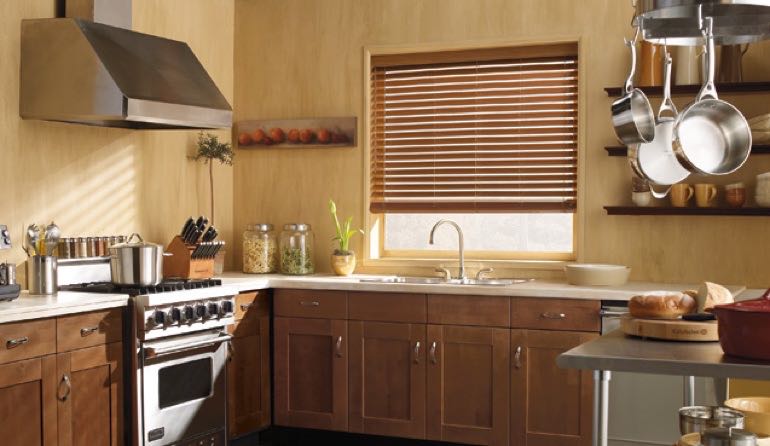 Destin kitchen faux wood blinds.